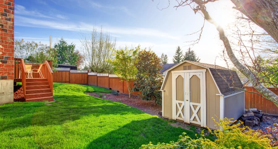 Fenced backyard with storage shed in Baton Rouge